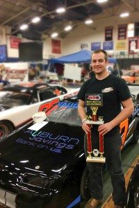Spencer Vaughan celebrates winning "Best Appearing Car" at the 2017 Racin' Preview held at the Portland Expo.